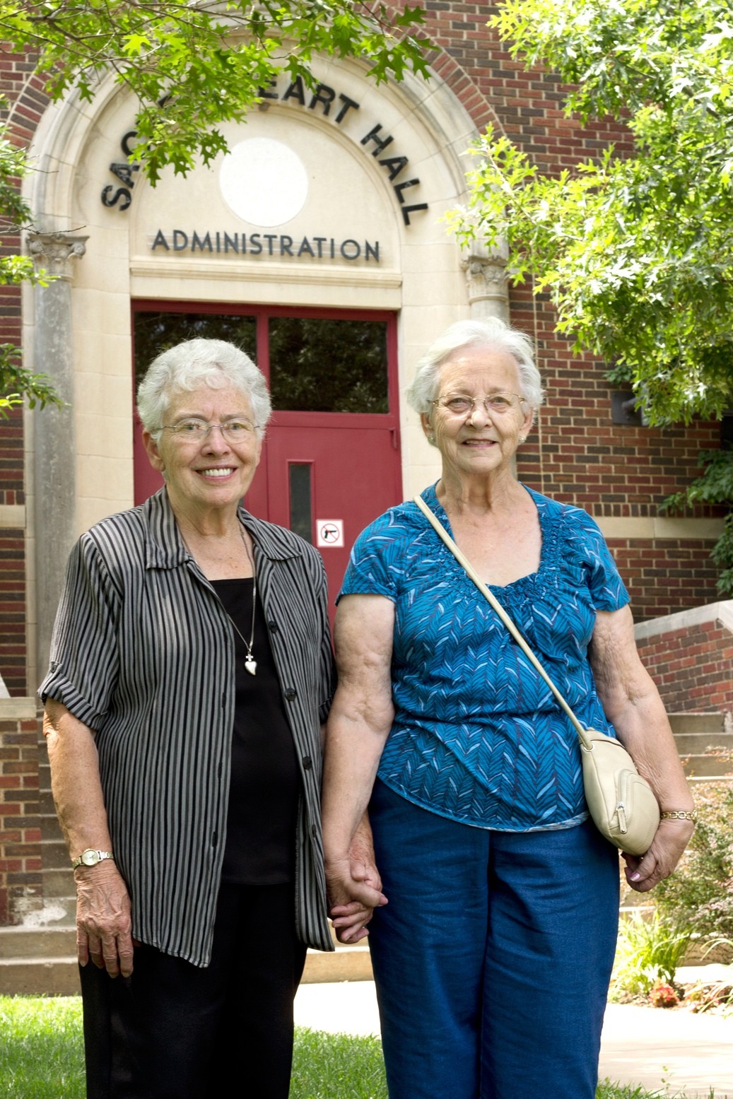 Sacred Heart College 1954 graduates Tarcisia Roths, ASC and Colene (Deusing) Kruse reminisced about their days as students during Kruse's Aug. 5 visit.