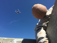 Drone flies above disaster area and locates "dummy" survivor.