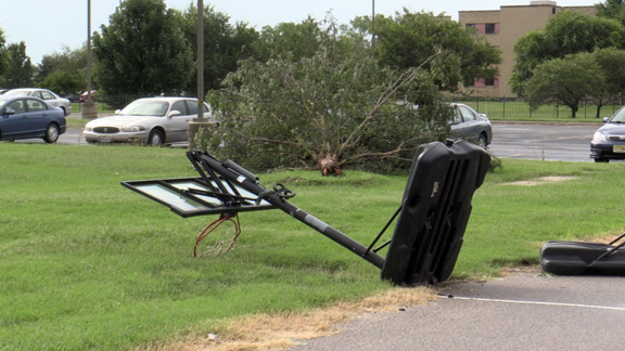 The storm damages six trees on campus.