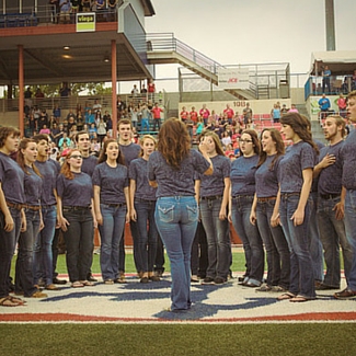 The Troubadours sang the national anthem at the Wingnuts game.
