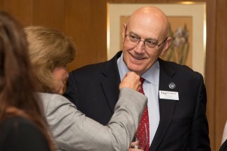 Newman VP for Enrollment Management Norm Jones visits with attendees at the Best Doctors reception (Photo credit: Wichita Business Journal)