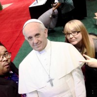 Admission Counselors Peter Abella and Georgia Drewes take a selfie with the Pope (okay - it's a cutout).