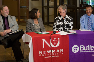 Newman University and Butler Community College sign an articulation agreement Thursday, Aug. 12