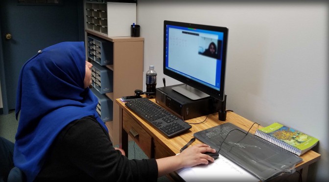 A student participates in a virtual info session