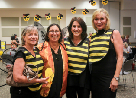 Picture of the Queen Bee Scholars team dressed in bee outfits.