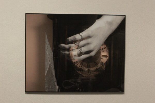 "Clock hands," plaque mount photography, $160, was created by Marissa Kucharek.