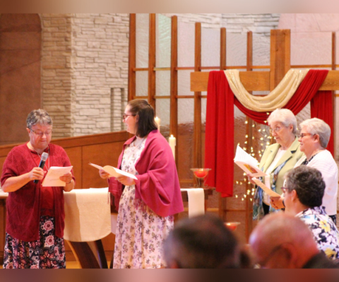 Sister Vicki Bergkamp, ASC, invites Sister Jenny to profess her vows.