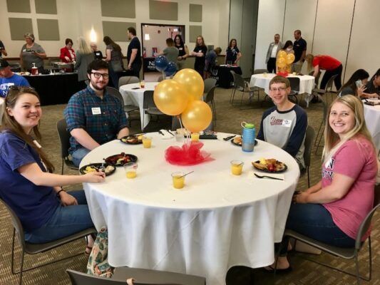 Newman alumni from the class of 2021 gather for a brunch in the Dugan-Gorges Conference Center.