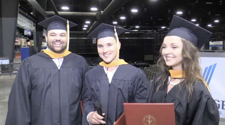 (left to right) graduate Jeffrey Bradford Casperson stands with fellow graduates Shawn Mayhew and Kseniya Luz