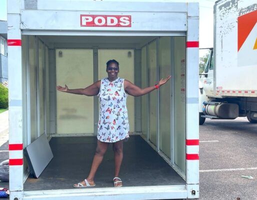 Roxxi Davis stands in a PODS storage container during the moving process.