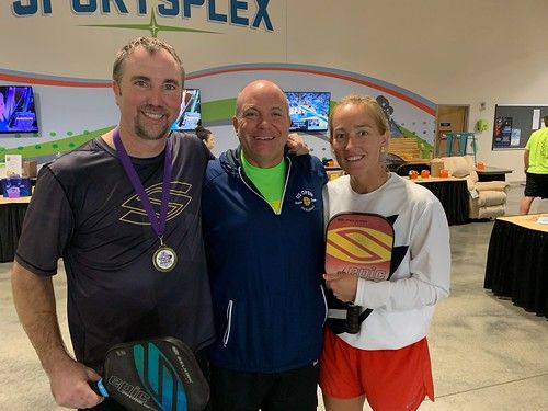Chris Heck, far left, has won gold and bronze medals in the U.S. Open of Pickleball.