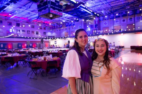 Students dress in Renaissance attire for the 2019 Party on the Plaza.
