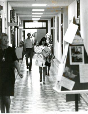 Students walk the halls of the Sacred Heart building as they make their way to class. Photo courtesy of Newman University Archives.