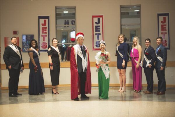 Mitch Austin (front left) and Karen Do (front right) were crowned as the 2021 Newman Homecoming king and queen.
