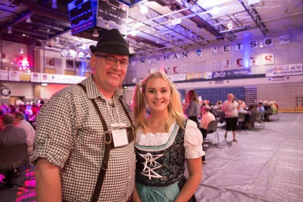 (From left to right) Master of Ceremonies J.T. Klaus with daughter Courtney at an Oktoberfest-themed Party on the Plaza.