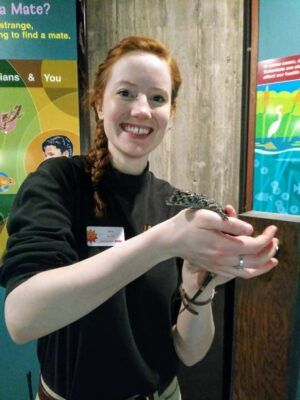 Amy Emerson holds a baby Chinese Alligator at her previous job at the Sedgwick County Zoo.