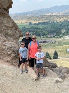 Deb and Jim Macias with great-nephews Sam and Jack at Devil’s Backbone Open Space, Larimer County, Colorado.