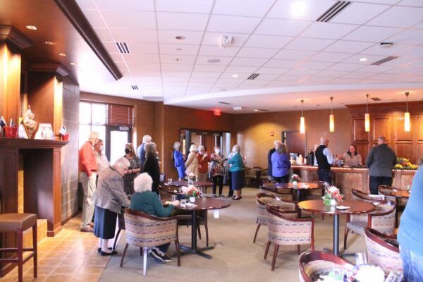 Newman faculty, staff and alumni gathered to celebrate the three retirees.