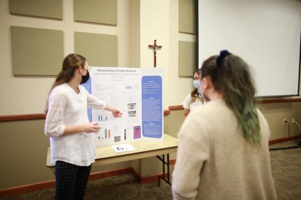 Students present their work over "Glucoseamylase Enzyme Research."