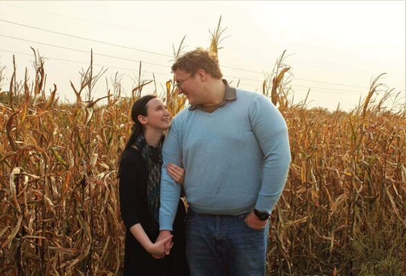 Madeline and Cole Schnieders in a corn field.