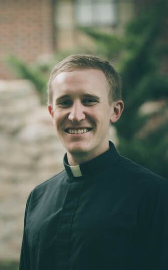 Newman University Chaplain Father Adam Grelinger