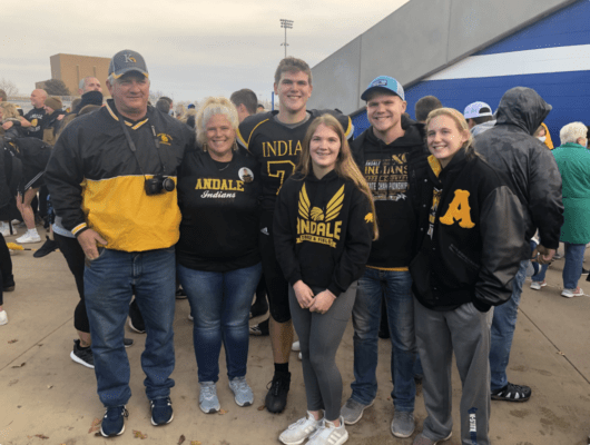 Cale Kerschen (second from right) and family following a 3A state football game.