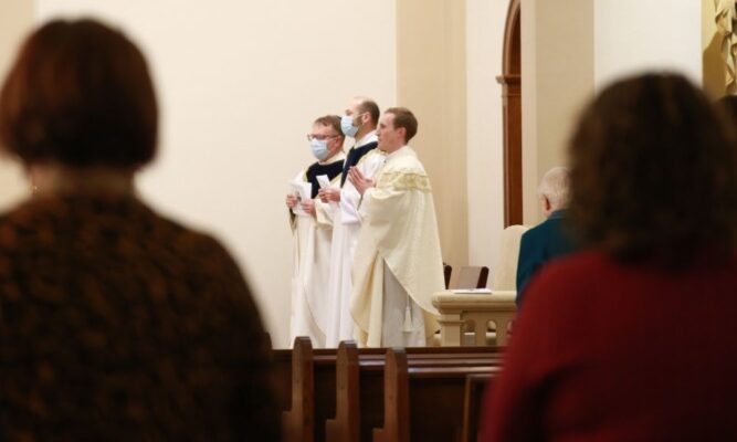 Fr. Adam Grelinger celebrates Mass for St. John Henry Newman