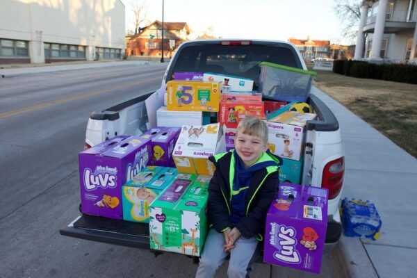 The disc golf participants of the Fr. Kapaun Classic collected 4,000 diapers to be donated to those in need.