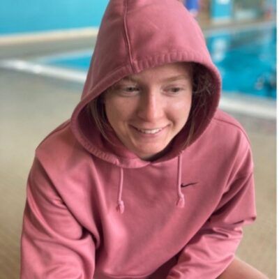 At the downtown YMCA, about to start our swim workout. This is a picture I took of my friend/teammate Makayla before we got in the water.