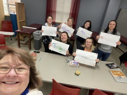 Instructor of OTA Melissa Smith takes a selfie with her OTA students. Emily Smith is pictured in the back row, far left.