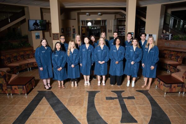 Newman students honored with 2022 Lab Coat ceremony.