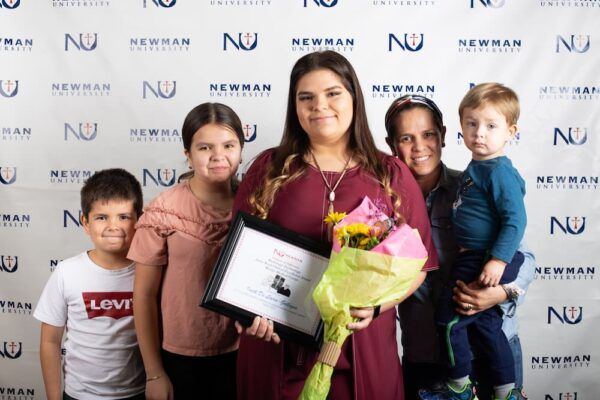 Iveth De Loera-Gallegos and family at the Newman Academic Awards Ceremony, spring 2022. Loera-Gallegos won the Radiology Technology Janie Ward Clinical Excellence Award for her work at Wesley Medical Center.