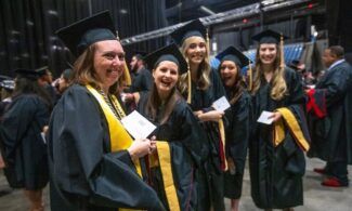 2022 graduates wait in anticipation before the Commencement ceremony May 6.