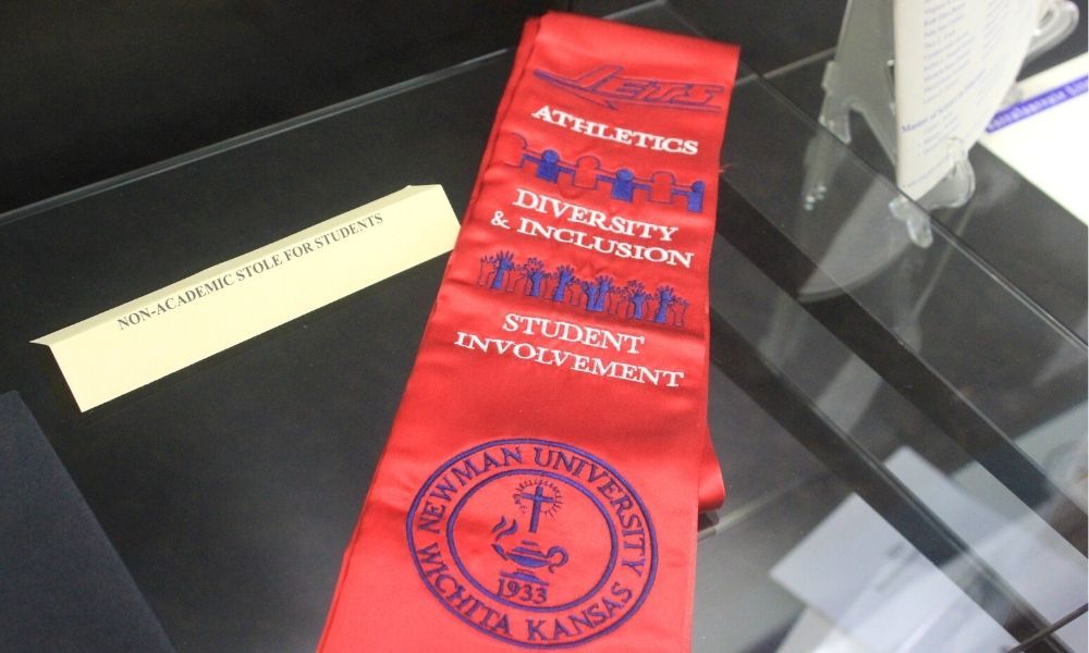 The three non-academic Newman University stoles for graduates celebrate student's dedication to athletics, diversity and inclusion as well as student involvement.