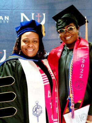 (From left to right) Bachelor of Social Work Program Director and Associate Professor Yelando Johnson stands with Valiore Corral, a Bachelor of Social Work who received advanced standing in the Newman Master of Social Work program. Courtesy photo, Yelando Johnson