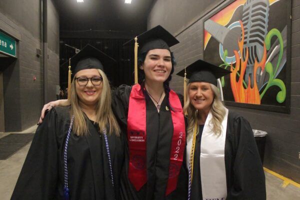 (From left to right) Newman University 2022 social work graduates Brandy Remy, Alice Miles and Dalton Shealy.