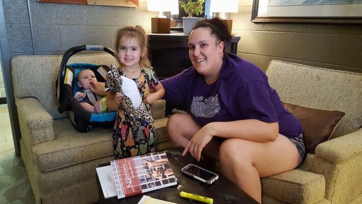 Kate Langworthy, with two young children in tow, went to Newman professor Teresa Wilkerson's office, ready to finish her degree and head to law school.