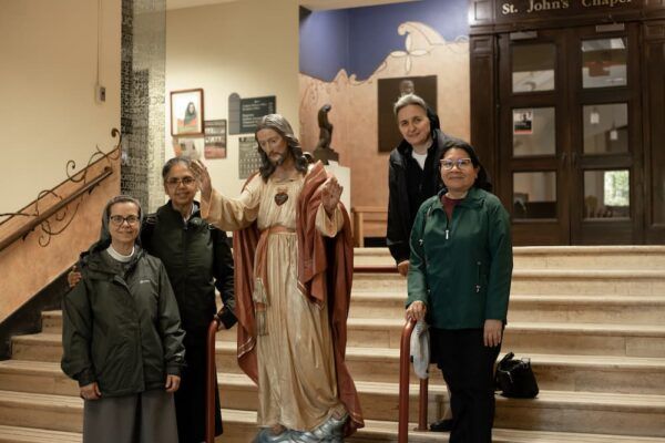 The Sisters make a stop by Sacred Heart Hall, home of St. John's Chapel.