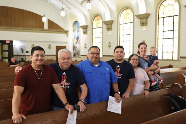 Student Nathan Galica's family attended noon Mass in St. John's Chapel during move-in day. Roxy Casas is pictured second from the right.
