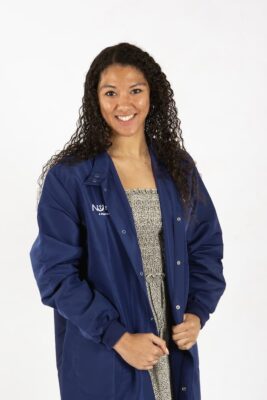 Jada Key in her Newman University lab coat.