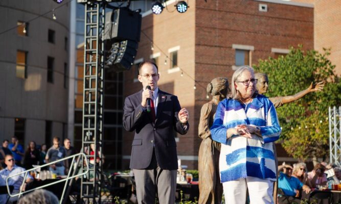 Mayor Brandon Whipple and Newman President Kathleen Jagger greet the guests of Party on the Plaza.