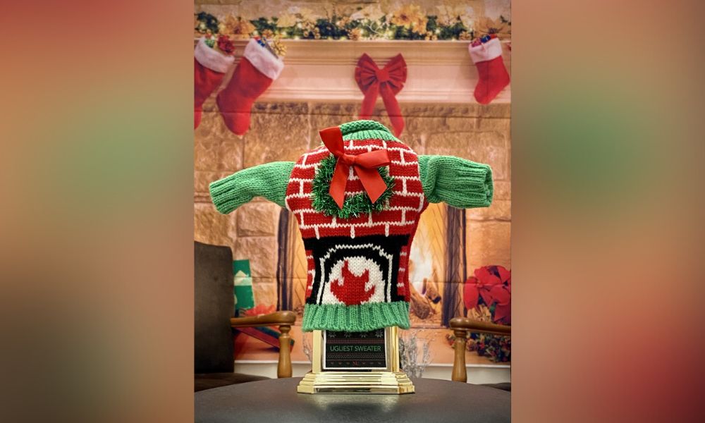 Ugly Christmas sweater traveling trophy from Staff Assembly
