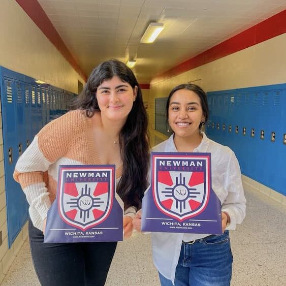 Luisa Salinas (left) shows off her acceptance to Newman University. (Courtesy photo)