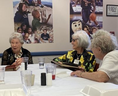 (l to r) Carol, Elaine and Helenruth share stories from the time at Sacred Heart Junior College.