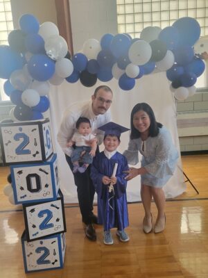 Reed and his family at his son's school promotion ceremony. (Courtesy photo)