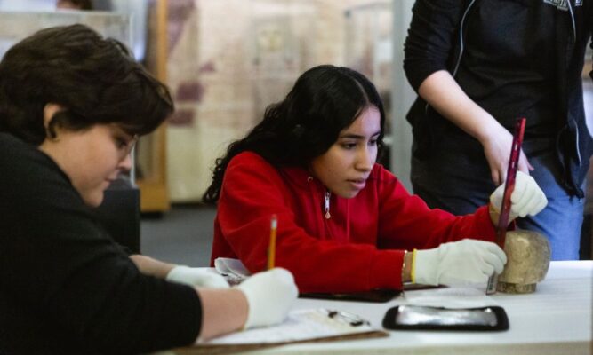 Newman University students conduct research at the Museum of World Treasures in Wichita.