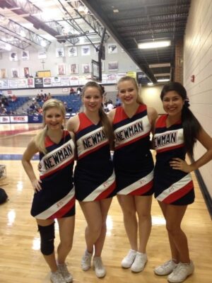 Efinger (second from the right) was on the Newman cheer and dance team. (Courtesy photo)