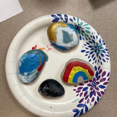 Meza led two events at the Wichita Family & Crisis Center for children and for staff members, both of which involved painting rocks as a gratitude practice. (Courtesy photo)