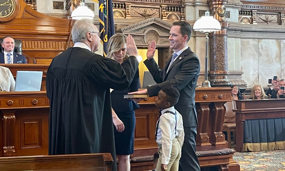 Newman graduate Chase Blasi swears in by Supreme Court Justice Eric Rosen with his family by his side on Monday January 9th, 2023.(Courtesy photo)
