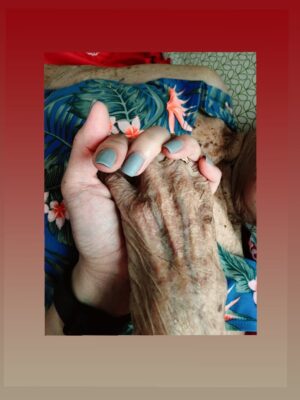 Gonzales-Bautista holds her grandmother's hand on a trip back home during the summer. (Courtesy photo)